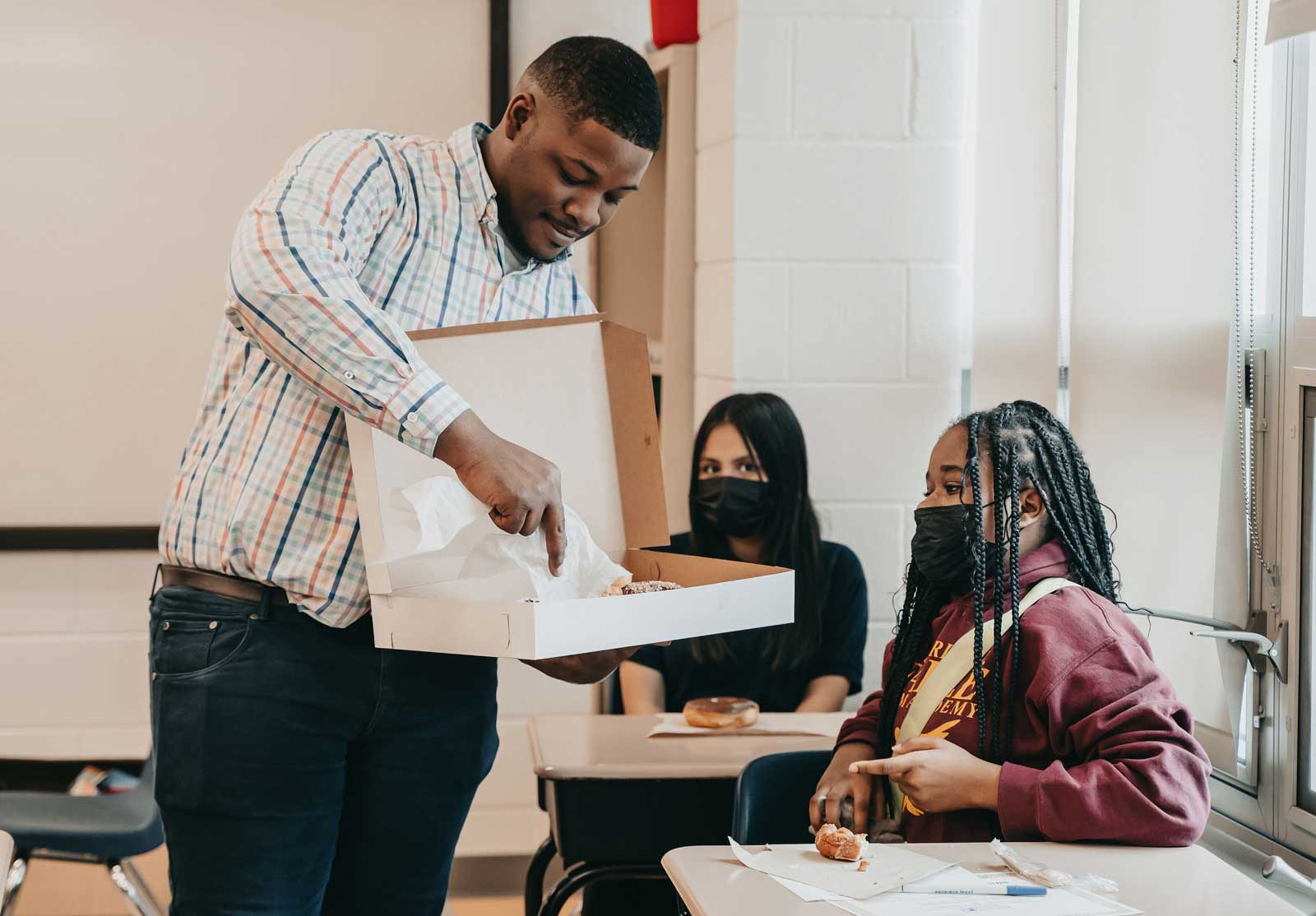 Earle-Teacher-with-Donuts